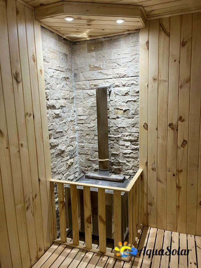 Calefactor eléctrico para sauna seco con diseño de piedra y madera en Quito